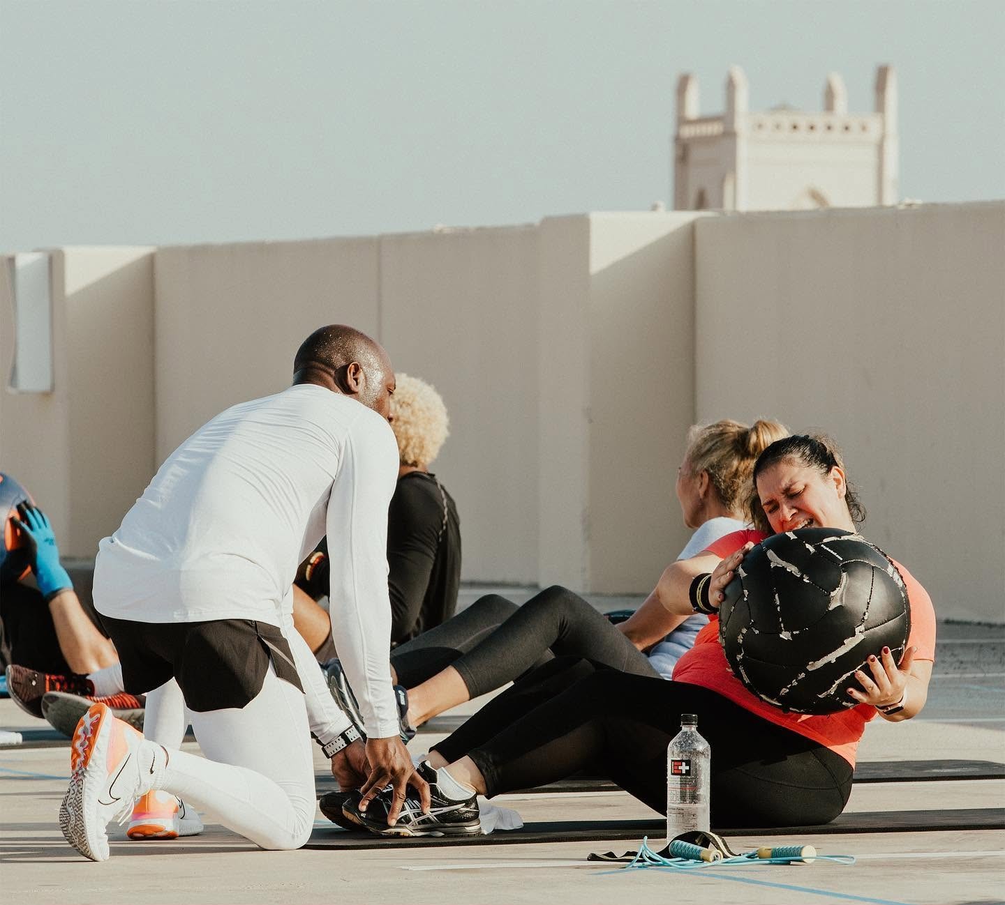 Alex coaching a Cardio Blast group workout on the downtown Brownsville rooftop